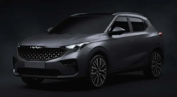 Nowy, ciemnoszary SUV z napisem "ITALA" na grillu. Kolejny przykład pięknych włoskich marek samochodów.